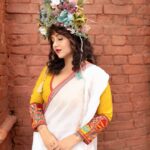 Swastika Mukherjee Instagram - Recreating one of Mashi’s saree borders on a dhuti - simple white as the Sarat Ritu clouds and a thin paar with Aam Kolka and Flowers. Dhuti in the length of a saree so that it can be worn as both. @swastikamukherjee13 looks straight out of a Greek fantasy world in our blouse and her mother’s saree recreated in Tant. Styled by @rishabhad Managed by @lipstickler Photographer: @upaharbiswas Make up: @prosenjit4867 Hair : @mallicknita.bigbi Location : Courtesy @ranit.maiti Kolkata