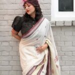 Swastika Mukherjee Instagram - This was one of the most difficult pieces to recreate. The same has similar motifs of Sambalpuri Ikkt borders and the lower half of the body had zari woven alongside cotton. Little flowers all over the body, big petalled flowers on the pallu. Big zari border and white with subtle black and brown. One of the most beautiful understated sarees in this series. @swastikamukherjee13 in the third from the “Maayer Sharee” series. Managed by @lipstickler Styled by @rishabhad Photography: @upaharbiswas Make up: @prosenjit4867 Hair: @mallicknita.bigbi Location : Niavara courtesy @ranit.maiti Kolkata