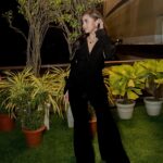 Tejasswi Prakash Instagram - In the game of @deltin_life , I bet on black. Tenniversary Celebrations at Deltin Royale 🖤🎲 . . . . . Styled by @natashaabothra With @mausmi_mitra_ Outfit @label_bella_d Jewellery @miranabymegha Shoes @aldo_shoes