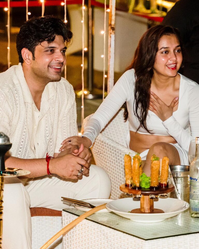 Tejasswi Prakash Instagram - To my best friend and my favourite human, to the star gazing nights on the sands, to a bottomless supply of beers, to never ending news marathon nights, to a infinity. Happy birthday (well belated - thanks to you) my love @kkundrra . . . . . @Elrow.goa @Elrow.pune @Prostacks_official @Sumeetchaudhary @long_island_iced_sheesha Elrow Ocean Front