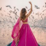 Aakriti Rana Instagram - Before you ask, lag rahi thi thand mujhe 🤣 But fashun is important 📍Yamuna Ghat, Delhi Have you ever been here, visit before all the birds leave. The sunrise here is absolutely breathtaking with thousands of birds flying around. P.s they feed them namkeen there to fly around the boat 🙊 Jitna bada namkeen ka packet, utne zyada birds around your boat. Outfit : @kalkifashion 📸. @shivam.vashisht @shivamphotoworks #aakritirana #yamunaghat #yamunaghatdelhi #sunrise #collab #photography #fashion #lehenga #indianwear #travelblogger #sunrisephotography #dreamy #delhi