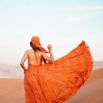Aakriti Rana Instagram - Always wanted to shoot something nice in the dunes! Watch till the end for the pictures! Got this super flowy set of dress and outerwear from @ordinaree.in and it looked so pretty in this colour with the dunes! ❤️ #aakritirana #sanddunes #photoshootideas #travelblogger #indiantravelblogger #lookbook #ootd #UAE #gifted #locationvspicture