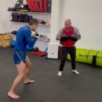Adam Borics Instagram - 🇺🇸 7 months ago I lost my first World Title Fight. This was the roughest preflight camp I had. A lot of things happened that people didn’t know. Later I had the first surgery of my life. It’s been a tough time for me, after 12-14 sessions / week, I couldn’t train at all. I’ve never been in this kind of situation before, but I was sure of one thing, I wanted to get back training as soon as possible. I’ve been working so hard to get healthy again, doing rehab everyday sometimes at times two times a day and using different therapies to recovery faster. I am almost there, I started with boxing, drilling, Today I kicked for the first time after 6.5 months. I’m still not 100% but we are almost there. I can’t wait to get back and get that belt! I’m hungrier than ever. The Kid 3.0 is coming! Second part of my carrier is ahead of me! Thank you for @drgelb he did an amazing job🙏 🇭🇺 Hét hónappal ezelőtt elveszítettem életem első Világbajnoki Címmérkőzését, Az ezt megelőző felkészülésem volt életem legrögösebb edzőtábora, sok dolog történt amiről az emberek nem tudnak. Később Megtörtént életem első műtétje. Kemény időszak volt számomra hiszen heti 12-14 edzés után nullára csökkent az edzések száma. Soha nem voltam ezelőtt ilyen szituációban De egy dologban biztos voltam Minél hamarabb vissza akarok térni edzésbe. Nagyon keményen dolgoztam hogy újra egészséges legyek. Mindent beleadtam a gyógytornába, néha napi kétszer is tornáztam. Mindenféle regenerációs eszközt használtam hogy a gyógyulásomat felgyorsítsam. Már majdnem ott vagyok ahol lenni szeretnék, elkezdtem boxolni, birkozni és ma hat és fél hónap után újra rúghattam. 😍 Továbbra sem vagyok még 100% de már tényleg nem sok kell. Alig várom, hogy visszatérhessek, megszerezzem azt a bizonyos övet. Éhesebb vagyok, mint valaha. The Kid 3.0 érkezik!