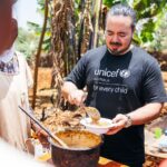 Adam Liaw Instagram – The most rewarding cooking demonstration I’ve ever done. 

Assisting UNICEF’s Mamans Lumière (Light Mothers) program in Ngozi Province. The Mamans Lumière program is where model mothers like Sibomana Christine teach young women about practical nutrition for their children.  Ngozi has one of the highest rates of childhood malnutrition in the world, with latest reports suggesting more than 60% of children experience stunting as a result of severe malnutrition. 

The Light Mothers teach about the balance and sources of macronutrients in ingredients that local women may be able to access, and UNICEF supplements this with a flavourless micronutrient powder containing essential vitamins and minerals for child development.

We made melangé, a nutritious Burundian stew made from whatever ingredients are on hand – in this case beans, lengalenga (amaranth, a Burundian staple), vegetables and small dried fish from Burundi’s Lake Tanganyika. 

The women said I was a good cook, but also commented that they had never seen a man cook before! Ngozi, Burundi