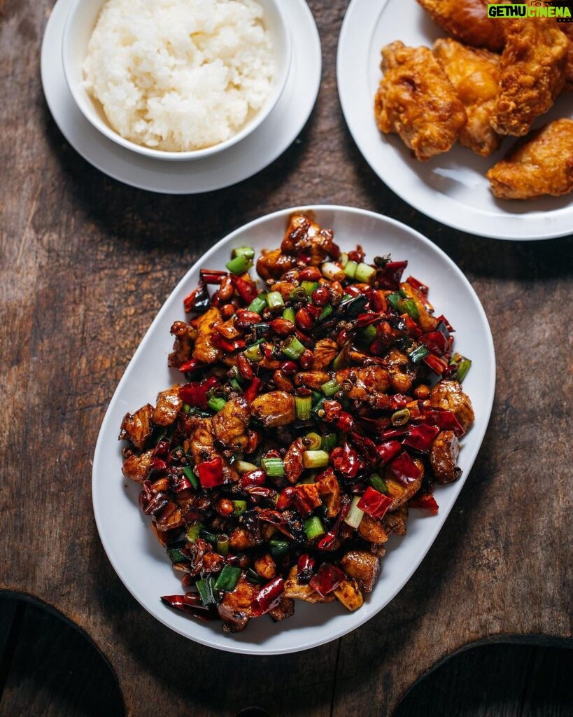 Adam Liaw Instagram - Tonight’s dinner. Gong bao ji ding (宫保鸡丁). A classic dish of Sichuan cuisine, but one that’s also been largely “lost in translation” creating so many misconceptions about Chinese cuisine outside China. It’s chicken flash fried with dried chillies, Sichuan peppercorns, spring onion and peanuts and within China it’s distinctive for (a) its seasoning profile of ma-la (hot and numbing) combined with sweet and sour, (b) being made with chicken breast, (c) and the inclusion of peanuts. It’s adaptations of “kungpao chicken”, “General Tso’s chicken” and “chicken with cashew nuts” largely remove the spice, replacing the dried chillies with capsicum and omitting Sichuan peppercorns, leaning more into a thick sweet and sour sauce, and use various nuts from almonds to cashews. It’s popularity, particularly in the US, has meant that many people’s idea of a stir-fry is chicken breast, coated in a sweet and sour sauce with a lot of vegetables, and some nuts sprinkled in at the end “for crunch”, despite there being very few Chinese stir-fried dishes that do any of these things. So next time you see someone sprinkling sesame seeds over stir-fry, know that this dish is what started that kind of stuff.