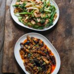 Adam Liaw Instagram – Tonight’s dinner. Yuxiang eggplant, and pork and broccolini. We talk about “one-pot wonders” but all this was cooked in one wok in less than the time it took for the rice to cook in the rice cooker (27 minutes) with plenty of time to spare. Served with a few pickles and a little bit of clear soup. 

Served on Everyday oval plates. I know it’s a small thing, but I designed this plate specifically so that dishes could be easily placed in the centre of a table to be shared. In Asian cultures dining tables are usually round, which means there’s plenty of room in the centre for sharing plates, but in Australia most of us (my family included) have rectangular dining tables so the oval plate is actually more economical on space and makes it easier to have multiple dishes in the centre.