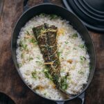 Adam Liaw Instagram - Tonight’s dinner. Flathead rice. Flathead tail grilled over flame and then steamed on top of rice in kombu stock with ginger, spring onion and toasted sesame seeds. A classic Japanese dish usually made with snapper, but works amazingly well with flatties. #鯛めし
