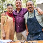 Adam Liaw Instagram - Tonight on #AdamandPoh’s Great Australian Bites @pohlingyeow and I are heading back in time (and to @visitgippsland) to explore the history of Aussie home cooking, making the ultimate lamb roast, dropping in to @hogget_kitchen, and catching up with the unstoppable @petereverettau at the Meeniyan Garlic Festival for a very special, live encore performance of Ready, Steady, Cook! (starring Poh and me)! Starts in 15 mins! @meeniyangarlicfestival #VisitVictoria #stayclosegofurther