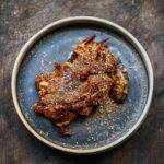 Adam Liaw Instagram – Tonight’s dinner. Sichuan lamb shoulder. Lamb shoulder cooked for 5 hours, then stripped off the bone and tossed in a sweet doubanjiang glaze then covered with a mixture of roasted fennel seed, cumin, Sichuan peppercorn, chilli and nori. This was soooo good.