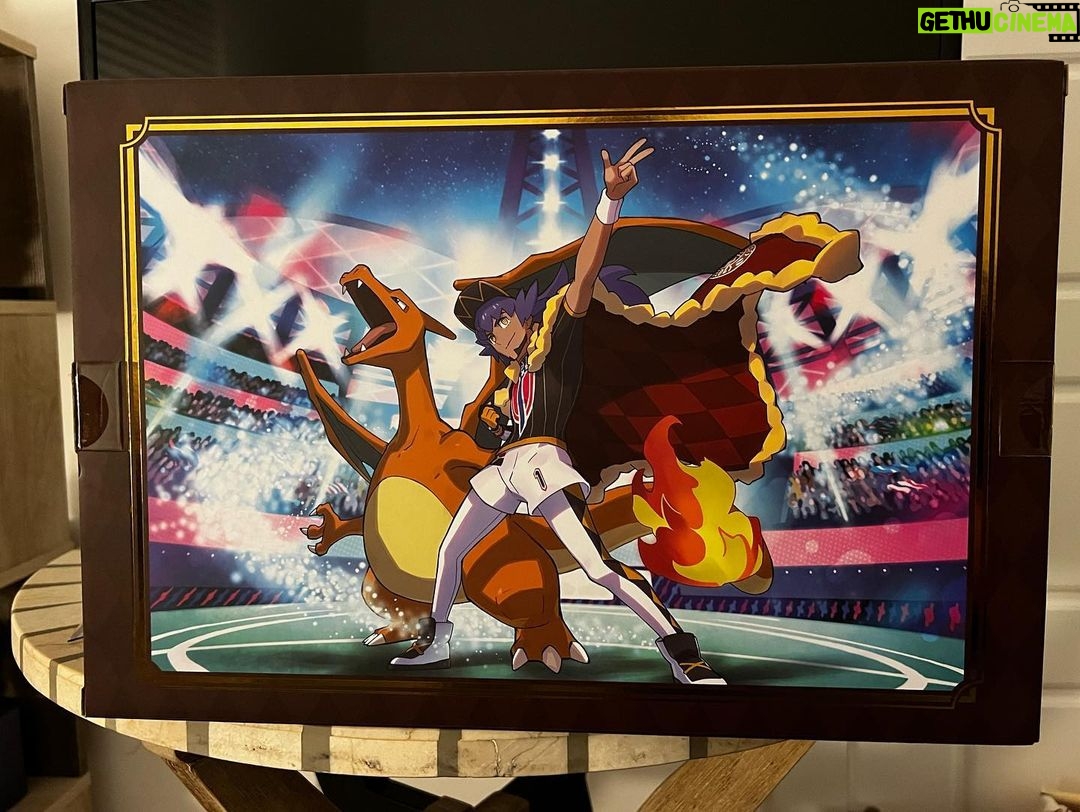 Alejandro Saab Instagram - So for Christmas, my parents got me this incredible Leon figure from Pokémon!! I haven’t taken it out of the box yet since they’re gonna ship it to me, but I was just so excited and it looks so COOL not to take a picture!! #pokemon #leon #anipoke #leonpokemon #charizard #figure #anime #voiceover #voiceactor