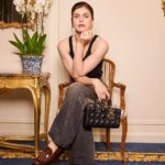 Alexandra Daddario Instagram - @dior handbags are my must have accessory. I’m going to need a bigger closet and more places to go!! @dior ❤️