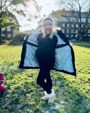Ali Bastian Instagram - 30 weeks today!! 🤰🏼 #bumpdate Feeling ready to fully enter hibernation mode, especially with this cold weather - two year old has other ideas!  In some ways it’s probably not the worst thing that she is helping me stay reasonably active. I’m still managing my Gestational Diabetes with diet - although never sure how long that will be for - I’m trying to not be too attached to the idea I can ‘control’ it and accept that if I need medication then that’s what I will do to keep me and bubba safe. Keeping moving more than I did in first pregnancy has got to be a good thing though! It’s hard to not be able to eat what I feel like - which honestly, most of the time is cake!! I miiiisssss caaaake!! And chocolate and crisps and did I mention cake??? Also top tip for anyone else preggo in this cold weather.. @seraphinematernity do this fleece lined set of thermals that I got a few weeks back when I was filming outside all day! 🎬❤️And their 3 in 1 Maternity to baby wearing parka is a faux fur lined dream that comes with an extra panel for baby wearing with a little hood. I was a big baby wearer with Isla and really hope to carry our new bubba! Swipe for frosty photo dump! 💜 #thirdtrimester #pregnancy #bump #gift