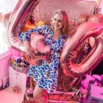 Ali Bastian Instagram - So this is 40! Thank you so, so much for all of your amazing messages. I had a lovely weekend filled with friends and family time and feel very grateful, especially in light of how alarming and turbulent everything is right now. Certainly makes me want to hold my fam a little closer. In terms of turning 40… it actually feels ok! … certainly a lot better than turning 30 felt! I remember really struggling with 30 - I was on the road touring with a musical, very lonely and homesick and actually spent the day in my digs in bed with bronchitis! I remember feeling that I wasn’t at the stage I ‘should’ be, as if there where these invisible boxes I ‘should’ be ticking… crazy really… Where my 20s were non-stop career wise, my 30s seemed to be about career and relationship highs and lows and getting well and truly lost in order to begin to ‘find myself’ … only to realise that I was never really lost to begin with, I was always there… just so busy I had forgotten how to feel. How to trust my instincts, how to listen to my knowing, how to sit with myself no matter how uncomfortable and uneasy and to comfort the parts of me that needed tending to… instead of running from them. In truth, I’m still working on ALL of this… I’m putting one foot in front of the other… but if 40 has invited in anything for me, it’s the deep desire to truly show up for myself and in turn, show up fully for those around me. 💜💫 *edited* It has just been brought to my attention that I have a baby wipe stuck to my foot in this photo 🤣… and that’s ok with me too. I’m here for all of it 😂💜