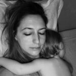 Ali Bastian Instagram - Toddler life. By Ali and Isla. Want to write something poetic about getting so upset about chalk that she cried out for Mummy milk and skin on skin. That although my milk supply is low and it is all coming to an end, she cried about it but seemed happier that we tried than me saying ‘later’ and then cuddled into me and fell asleep. That today, clothes are the enemy. That she has incredible moments of independence and bravery and will do crazy mountain goat kitchen climbing. That she loves drawing and is our very own Banksy. That she doesn’t want to hold my hand when we are out walking and is settling well into nursery and that she wants to sleep on me and feed at 10pm, 12am, 2am, 4am and 6am. That I’m so completely in love and I feel like I have concussion from sleep deprivation. That I want the world for her and want to keep her safe in a bubble. Not very poetic as I’m tired today but a little window into our perfectly imperfect world 💜