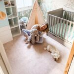 Ali Bastian Instagram - Finally finished Isla’s nursery!!!!! Paradise desert island scene - complete with monkeys, flamingos, penguins and a sloth as requested by my little 🐒. More photos to follow! Painted by my beautiful friend @agaskiba.art 🌈💕 We ended up doing a great big game of house Tetris when we realised we were never going to feel settled sleeping in the loft room with the nursery on the floor below - so we moved into Isla’s room and turned the spare room/office into her nursery. It’s worked so well and has actually been lovely to have another run at designing her room. The only thing is we hear a lot more from our neighbours beneath on this floor and we realise they must hear so much from us!! We went to @carpetright_uk to help solve it - decided to dispense with the old wooden floors and went for Celestial underlay which is great for heat and sound insulation. Whenever I’ve bought carpet in the past I’ve always gone for a more luxurious carpet - panicked at the price and then bought one of the most budget underlays! Decided to do things another way this time and went for Amberly in Blush which is one of their budget range carpets - and the result is absolutely bloody brilliant!! Top tip - splurge on underlay and even the most reasonable of carpets will feel soft underfoot! I’m so please with the soft, pretty colour - we have put it in our room too and Am so tempted to run it through the whole flat! #nursery #babygirl #nurserydecor #nurseryart #carpet #underlay #spon