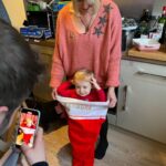 Ali Bastian Instagram - Christmas Photo Dump!!! 🎄🎄🎄 We felt so incredibly lucky to be able to share Christmas with my family given the absolute hellish lottery of the Covid situation at the moment. D had one day off Panto so Christmas Day was just the three of us…. With my fam popping in and out the rest of the time and a lovely late night doorstep visit from my in-laws. ❤️ 📸 1.Christmas Eve game starting strong. 2. My mum upping the Xmas ante by putting my child in a stocking. 3. Bella (my Mum’s dog) and Isla were inseparable. 4. Christmas Morning… my little early riser discovering her new kitchen! She makes a mean ‘cup of cino’ ☕️. 5. Getting a full Xmas dinner out of the oven by 12 so we could all eat together on Isla’s schedule meant we were all still in our pyjamas and no chance to run a brush through my hair or so much as stick on an eyeliner. It was chaos … but it was our chaos ❤️ 6. … just because ❤️ . 7. Boxing Day … finally got some make up on and an ‘out fit’… David bought me a mini ring flash and I was trying to look cute… but just managed to look a bit dead eyed and weird 😂. 8. First time we ventured out of the house after living like hamsters for three days 🐹😂. 9. I LOVE this pic that my mum took and sent to me… I didn’t know it existed. It’s quite emotional to see myself looking so happy and relaxed. Isla has multiple allergies and weaning was a white knuckle ride. For a long time just setting foot in the kitchen I was on absolute red alert. This captures my baby enjoying her food and the simple joy that brings. It makes me realise how far we have come. 10. Merry Christmas ❤️🎄🌟