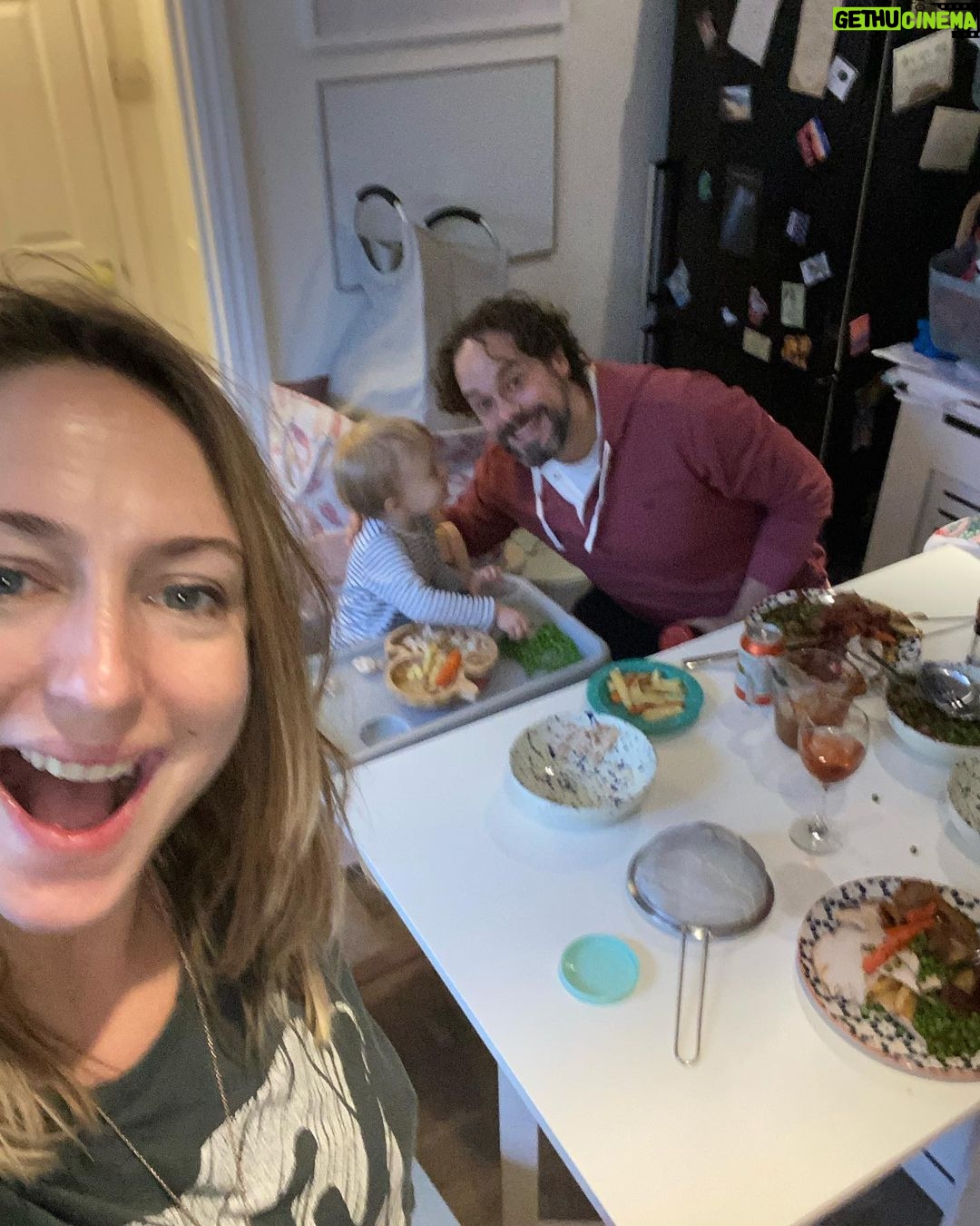 Ali Bastian - 1.1K Likes - Christmas Photo Dump!!! 🎄🎄🎄 We felt so incredibly lucky to be able to share Christmas with my family given the absolute hellish lottery of the Covid situation at the moment. D had one day off Panto so Christmas Day was just the three of us…. With my fam popping in and out the rest of the time and a lovely late night doorstep visit from my in-laws. ❤️
📸 1.Christmas Eve game starting strong.
2. My mum upping the Xmas ante by putting my child in a stocking.
3. Bella (my Mum’s dog) and Isla were inseparable. 4. Christmas Morning… my little early riser discovering her new kitchen! She makes a mean ‘cup of cino’ ☕️. 5. Getting a full Xmas dinner out of the oven by 12 so we could all eat together on Isla’s schedule meant we were all still in our pyjamas and no chance to run a brush through my hair or so much as stick on an eyeliner. It was chaos … but it was our chaos ❤️
6. … just because ❤️ . 7. Boxing Day … finally got some make up on and an ‘out fit’… David bought me a mini ring flash and I was trying to look cute… but just managed to look a bit dead eyed and weird 😂. 8. First time we ventured out of the house after living like hamsters for three days 🐹😂. 9. I LOVE this pic that my mum took and sent to me… I didn’t know it existed. It’s quite emotional to see myself looking so happy and relaxed. Isla has multiple allergies and weaning was a white knuckle ride. For a long time just setting foot in the kitchen I was on absolute red alert. This captures my baby enjoying her food and the simple joy that brings. It makes me realise how far we have come.
10. Merry Christmas ❤️🎄🌟