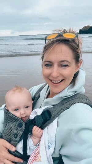 Ali Bastian Instagram - West Cork we 💚 you ☘️#travel #baby #babygirl #motherhood #family.  Ps. It’s taken a few messages and comments for me to realise that Izzy is flicking the bird TWICE on this video. My child is a clown 🤣 Carrier @babybjorn #gift