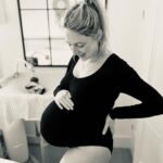 Ali Bastian Instagram – Last bump pic the night before going in to deliver Izzy. 💜 So full of emotions and anticipation! It wasn’t such a smooth ride c-section wise this time. I’ve gone on to have really delayed healing with my incision, it’s been so frustrating and really easy to feel like it’s me vs my body on this very different postpartum journey. I have my beautiful baby girl in my arms now and so important to remember what a tremendous journey my body has been on! Trying to be kind to myself, but also so hard to move forward in any way until I’m properly healed. Fingers crossed I’m on the mend now! 🤞🏻🤞🏻🤞🏻💜💫 Body suit @jorgen_house #gift