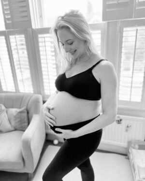 Ali Bastian Instagram - Happy NY 🍾 Hope you all have a lovely evening whatever you are planning. We are very much in hibernation mode and fairly sure I won’t be awake at midnight 🤣… In my 34th week now…. Eeeeek!! It’s flying. Cannot wait to meet you baby girl 💖 (but WILL wait another few weeks, so you can please stay just where you are for now!) Still feel like I have so much preparation to do and all I want to do is sleep and eat 🤣 Wish you all the love, luck and happiness in the world for ‘23 💖  Super supportive nursing bra: @marksandspencer  Most comfortable maternity leggings in the world: @natalactive @mumandme_app #mumbrand #gift #thankyou #thirdtrimester