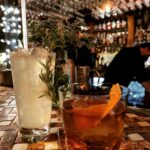 Alison Haislip Instagram - 2022 was a year of great travel. But it was also the year I perfected the art of taking really pretty pictures of really pretty drinks. So instead of a recap of my travels, here's a recap of my drinks on my travels. From the Netherlands to New Orleans to New York, and from London to my home city of Los Angeles (with some Hilton Head and St Helena sprinkled in as well), it's been a beautiful journey. If you're someone I shared one of these drinks (or any drinks!) with this year, thanks for being part of the ride. Cheers to 2023🥂