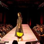 Amber Midthunder Instagram - pilamayaye @j.okuma for having me walk for you at @swaianativefashion 🖤 it’s always such an honor to wear your creations and watch you work. also only the coolest designers play the hu 😌
