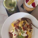 Ambika Ranjankar Instagram - Sunday lunch done extremely well👍 @sunokissa The lunch started with Roasted onion soup(Just right for this season)👍 Along with Starters Tomato olive bruschetta(crispy and crunchy every bite) and Nachos(was all dressed with cheese, olives, jalapenos, kidney beans and cream)💕 Which was a supremely divine combination! Mocktails are my favourite and was presented with these yummy flavours Vruksh🥤 Lemon mint🍸 Mix emotion🍹 The main course was Burmese curry steam rice 🍲and Ala Verdure Pizza🍕 Mamma mia!!! Loved both the rice and the pizza equally. Time for desserts Tres Leches Banoffee Pie Tart🥧 Hazelnut chocolate mousse cake🍮 All three eggless but full of fun for the taste buds! All 3 very extremely different in taste and full marks to the sweet ending😀 This place is a must visit, if you haven't gone as yet! @sunokissa 461, off Lokhandwala road, Adarsh nagar, Oshiwara, Mumbai, Maharashtra 400102