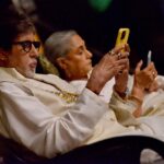 Amitabh Bachchan Instagram - Parents at work on shooting set .. as lights camera get ready 😂😂😂🤣 favourite pastime