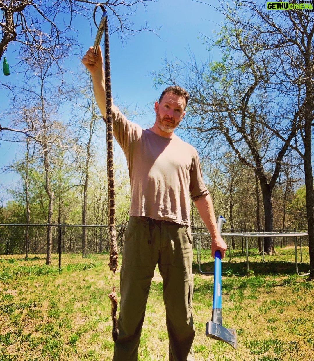 Amy Bailey Instagram - Husband Appreciation Post: Last year we made the difficult decision to uproot our family and move from London to Texas. My mama is very sick and I just couldn’t be separated from her and my sweet dad while they are going through the deep trauma caused by her dementia. Anthony and I both come from very small-town humble beginnings, so the London life we had built from scratch and curated together felt pretty special. There was glamour and excitement and people and places that dazzled us. We felt proud to have “made it” in a way. Texas life now is much slower, rural, and at times feels like a strange dream that isn’t ours. The guy in this photo has gone through some big adjustments in order to be supportive of me and my desire to be closer to my parents. Not sure that dealing with 8ft snakes in our backyard was ever on his bucket list. I don’t know where this peculiar road is taking us Anthony, but I’m glad to be travelling it with you. Onwards, ever onwards. Love you 💜 *EDIT* For those who think this might be some sort of trophy-bragging of killing an animal - it’s not. Texas has a LOT of very dangerous snakes and a non-native dad, worried about his kids, just reacted fast to it attacking our pet. Thank you to all concerned…YES we later researched it to be a harmless rat snake and NO we wouldn’t deal with it like this again 🙏