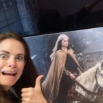 Amy Bailey Instagram - HOUSEGUEST ETIQUETTE 🏠 After staying at a friend’s house, it is considered good manners to leave a little memento behind. Just a small token of appreciation so they can see it now and again and think fondly of you. So I put a giant poster of myself in front of @clivestanden’s TV. You’re welcome buddy! Enjoy!