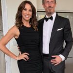 Andrea McLean Instagram - Tonight we are ‘out out’! Some ‘before we left the house’ pictures taken by @makeupcouk who is wholly responsible for making me look so glam. Thank you to @boodles for the jewellery tonight. Very impressed by Mr F in a dickie bow. 🥰 #wcw23 (And yes, that is an Elf fridge magnet behind us. Because Elf isn’t just for Christmas… 😁)