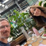 Andrea McLean Instagram - 4 things I did last week to fill my cup that had nothing to do with work. I actually have lots of photos this week, which is very unlike me! 😁 1. I went to the first anniversary celebration of @tessysbrunches hosted by the magnificent @tessyojo Her drive and commitment to help women feel good is something we are 100 per cent aligned on!😊 Thank you @palassociates for the brilliant reportage photos. 2. Played tennis with Mr F. It was sunny. He won. You can’t have everything… 🎾 3. @emmaguns popped round for coffee which is always a highlight of any week. Our chats are long, detailed, uplifting, hilarious and slightly scurrilous… my favourite kind. 😁 Plus, she rates my poached eggs, so she’s a keeper. 4. Mr F and I went to my friend @petecohen_ Magnificent Health Summit and listened to some wonderful speakers talk about their learnings in the healthy mind and body space. @lucywyndhamread discussed her fitness journey from always being picked last for games in PE at school, to joining the army, to uploading a few fitness videos to YouTube back in the 90s - which led to a thriving fitness business and over 100 million views! @dr_bob_rakowski shared his experience and learnings in how the brain and body work, which was fascinating. I got a copy of this brilliant book by Carl Benton which is part cookbook, part mindset feeder (a brilliant idea) with all profits going to Stroud Women’s Refuge. (You can pick one up at www.inspiredcookbook.co.uk ) We also popped out for our lunch break to Spitalfields Market - yum. The last picture was taken a split second before I fumbled and dropped my dessert on the floor. 🤦🏻‍♀️ 3 second rule meant I still finished it. 😋 A lovely last week of August. #4things