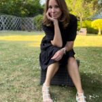Andrea McLean Instagram - Why I like wearing black in summer… I know it’s not exactly bright and breezy, but it’s still my go-to. I realised this as the past two weeks have been super scorchio, and yet 80% of what I wear is still black with pops of colour. Why? 🙂I feel comfy in it. 🤩I feel classy in it. 😎I can stick heels on and feel dressed up or sliders and feel dressed down. 🙌I can wear the same thing from day to night. 😊I still feel like ‘me’. 👀I don’t have to wear a bra when it’s really hot and no one knows… These two dresses are case in point and have become my summer faves this heatwave. They’re from @nextofficial and I love them. #summer #hot #whatilike #next #fashion #gifted