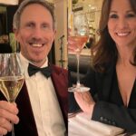 Andrea McLean Instagram - How it started… How it finished… I don’t go out on NYE. Of course I have done, but it’s not really my ‘thing’. But this year we thought we’d start a new tradition and booked a 6pm sitting at @langansbrasserie We got dolled up, got the tube into town and had a lovely time. Then headed home and were in our comfies by 10pm, watching the night unfold on the telly, dog asleep on my lap. @officialrickastley @rylan and @sharleenspiteri were bloody BRILLIANT tonight bringing in the new year. I’m happy to do it all again next year if they are. 😄 #happynewyear 🥂