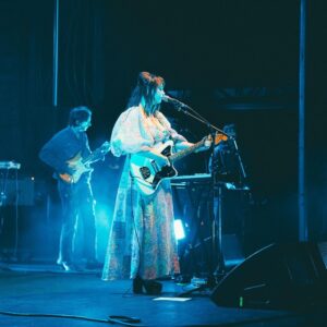 Angel Olsen Instagram - I still can’t believe it.  Hollywood Forever Cemetery was one of our biggest LA shows yet. Did you see the ghosts ? How about the five cats hanging out by the tombstones? Did you see Mel Blanc’s grave? 

Sometimes I can’t believe this is what I’m doing with my life - Thankyou for listening, singing my songs with me, making them come alive over and over again. 

🦚

Thank you to @kingtuffy for playing with us. Thank you to @burgers for the DJing. Thank you to @hwdforever for having us. 

Photo 1 by @maximludwig 
Photos 2-5 by @pentaxplayboi