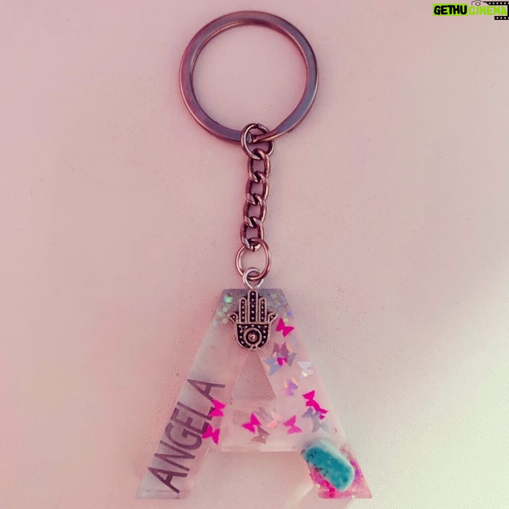 Angela Zahra Instagram - This is the cutest keyring ever, it was personalized specially for me by the talented @morgansmomentsgifts with all the things that i love, my name, pink butterflies, turquoise stone and the hamsa hand 🧿🦋 Go get your one @morgansmomentsgifts #morgansmomentsgifts #collaboration #collab #angelazahra 💕#انجيلا_زهراء #انجيلا_زهرة