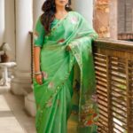 Anindita Bose Instagram - This Durga pujo deck up in this sheer green handwoven ensemble with Durga motif embroidered on the Anchal and blouse back. The lotus detailing with intricate border created all over the saree evokes a sense of eternal beauty, making it suitable for any time of the day. May it be your pandal hopping session or quick meet-ups with your friends, ace the look with elegance and in style. Beauty @aninditaa_bose Pictures @bijaya_datta @shyanjit0707 Location @therajbaribawaliofficial HMU @abhijitpl2 @ginni_love21 @sanandalaha Styling @stylebysumit Song credit @monami_ghosh #sayantighoshdesignerstudio #sayantighoshpujocollection2023 #festivecollection #festivewear #durgapuja2023 #maaasche #duggadugga #nabami #navadurga #durga #durgasaree #durgablouse #organzasaree #handembroidery #lavender