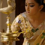 Anindita Bose Instagram – Save this quintessential golden ensemble for your Ashtami. With intricate embroidery all over the body, it is perfect for pandal hopping or barir anjali with your loved ones. Already beholding the beauty of flowers & Maa Durga embroidered  border detailing, accessorise it with some jewellery and your are set to turn head over heels.

Gracing the ashtami look @aninditaa_bose

#sayantighoshdesignerstudio #sayantighoshpujocollection2023 #festivecollection #festivewear #durgapuja2023 #maaasche #duggadugga