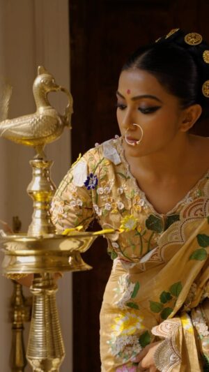 Anindita Bose Instagram - Save this quintessential golden ensemble for your Ashtami. With intricate embroidery all over the body, it is perfect for pandal hopping or barir anjali with your loved ones. Already beholding the beauty of flowers & Maa Durga embroidered  border detailing, accessorise it with some jewellery and your are set to turn head over heels.

Gracing the ashtami look @aninditaa_bose

#sayantighoshdesignerstudio #sayantighoshpujocollection2023 #festivecollection #festivewear #durgapuja2023 #maaasche #duggadugga