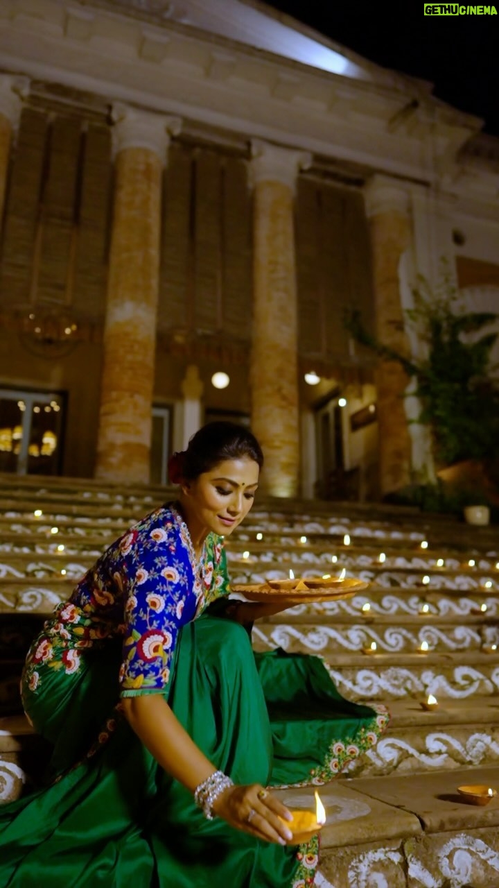 Anindita Bose Instagram - Happy Diwali 🪔. Wishing you all a sparkling Diwali filled with love, light and happiness. This diwali, ravel in the beauty of stunning six yards from Sayanti Ghosh. Embroidered all over with red and white flowers that rightly compliment the green hue of the saree. To contrast and create the correct balance of colours this ensemble is paired with a bright blue blouse with similar floral embroidery that is sure to be your favourite forever.