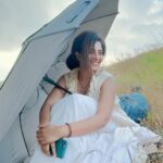 Anjali Instagram – A girl with no name 💫
#yezhukadalyezhumalai 

#7k7m #directorram #in #between #shoot #actorslife #nature #girl #with #umbrella #somewhere
