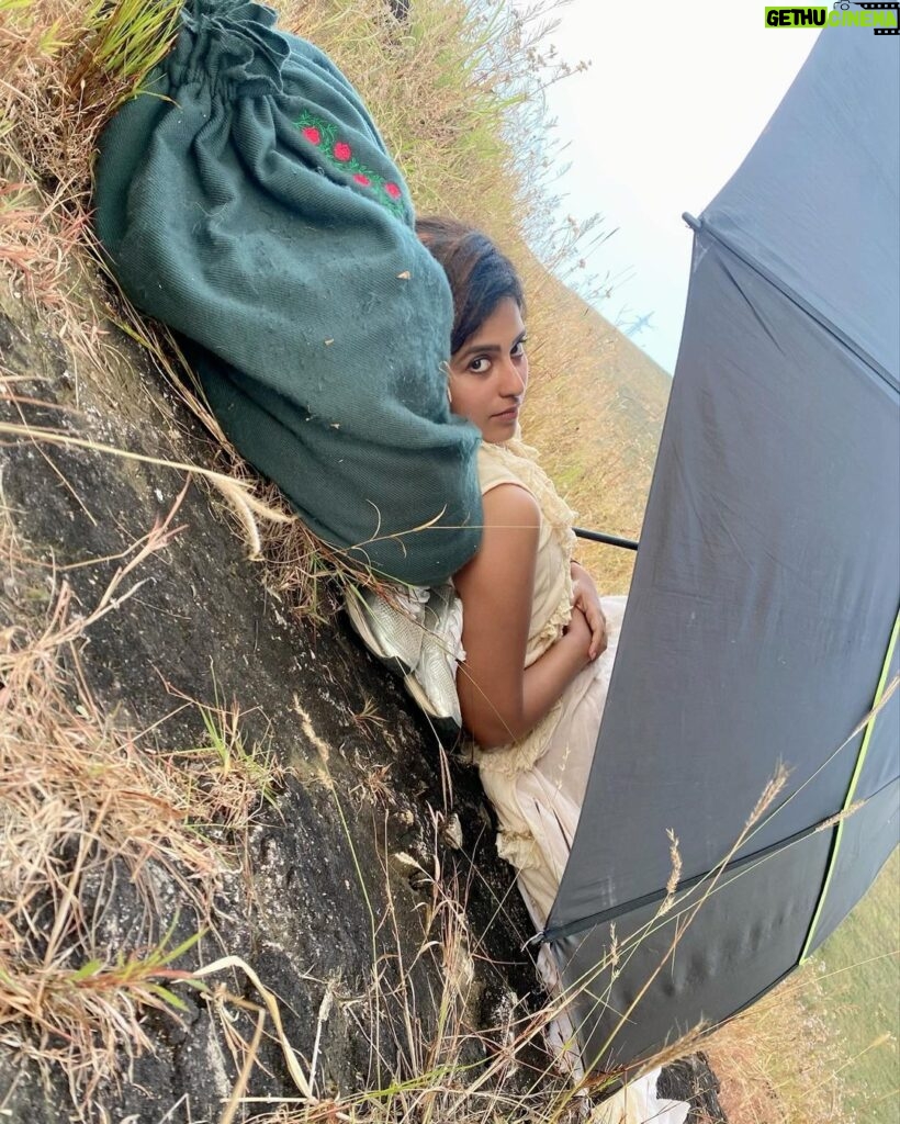 Anjali Instagram - A girl with no name 💫 #yezhukadalyezhumalai #7k7m #directorram #in #between #shoot #actorslife #nature #girl #with #umbrella #somewhere