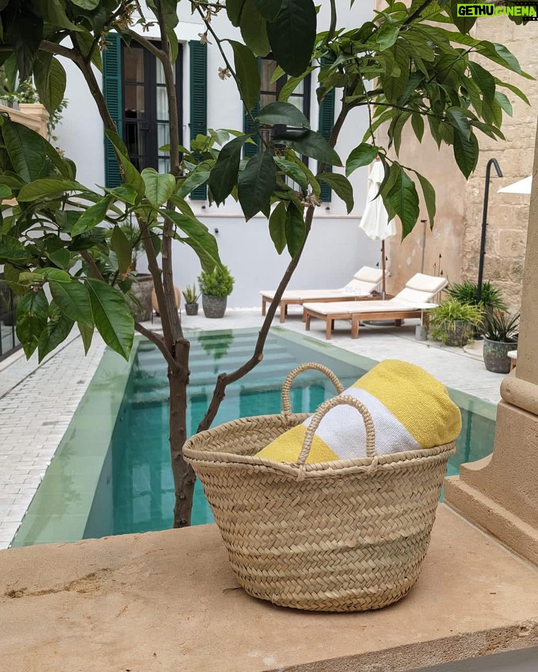 Anna Passey Instagram - Me and @kylepryor ‘s foot having a much needed rest weekend at @concepciobynobis in Palma. We LOVE staying here, it’s so calming and relaxing, you feel disconnected from the world, but you are right in the centre of Palma. A magical place. Check out my new travel blog and page over at @travelpassanna for more content. Concepció by Nobis