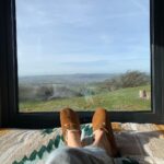 Anna Passey Instagram - The last few days have really felt like Spring is just around the corner, what better way to watch the changing of the seasons than totally immersed in nature. We have had the most UNREAL stay with @unyoked.co who have long had their cabins in AUS and NZ but now LUCKILY have some of their gorgeous little hideaways in UK. Perfect little retreats in the middle of nowhere, ideal for unwinding, relaxing and resetting to nature’s pace. Morning frost, epic sunsets, outdoor cooking and a warm snuggly bed, what more could you need?? Thank you for having us Unyoked 🤍 #kindlygifted The Middle of Nowhere