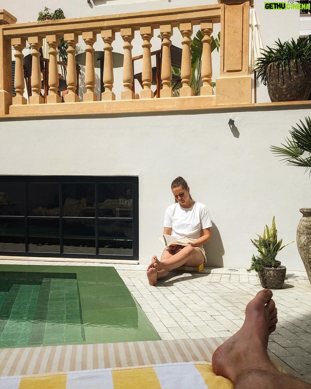 Anna Passey Instagram - Me and @kylepryor ‘s foot having a much needed rest weekend at @concepciobynobis in Palma. We LOVE staying here, it’s so calming and relaxing, you feel disconnected from the world, but you are right in the centre of Palma. A magical place. Check out my new travel blog and page over at @travelpassanna for more content. Concepció by Nobis