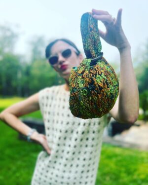 Anna Wood Instagram - Well I was originally going to a certain premiere of a certain movie with a certain man I love in it. But I ain’t no scab, hunty. #SagStrike #UnionStrong #payyourartists 

I can’t help but feel honored and thankful to the amazing upstate designers I was lucky to collab with on this insanely cool lewk. To @eleven.six for this modern, timeless, comfy, elevated, effortless dream dress: THANK YOU! To @madebymle for this functional art that both glams me up tenfold, makes the room sparkle, and hides my snacks: THANK YOU! And of course to @waginnboarding for always welcoming my poodle with open arms: THANK YOU! 
Hair/make up: me 😎
Glasses: @dleyewear 
Shoes/bracelet/earrings: @prada 
Photography/resident hottie: @danedehaan
