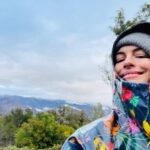 Anne Hathaway Instagram - Happy #EarthDay! Sent with love from inside my #secondhand raincoat! 🌈🌎🌍🌏🌈