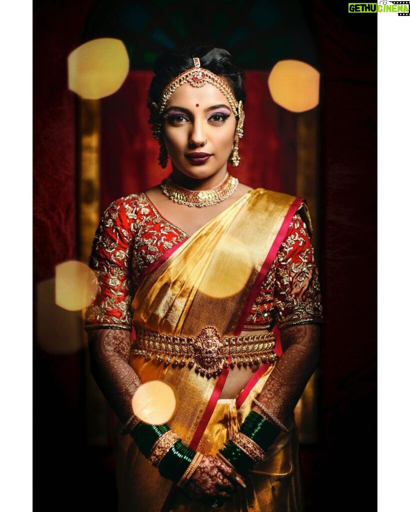 Arjun Kamath Instagram - It was an honour to capture @lakshmiambarish, an otherwise vivacious bride, in a simple moment of poise right before her wedding ceremony. She had adorned a glowing @gaurangofficial saree and was just stepping out, anticipating her big day, when I made this picture. In the photographs I share from later that day, you will see her fun-loving and bubbly self too, who can effortlessly bring the whole room to life with her mere presence. But today, I am in complete admiration of her soft smile and uncomplicated grace, making one wonder what emotions are springing inside of her. Outfit- @gaurangofficial @bridesofsabyasachi Jewelry- @kishandasjewellery @shriparamanijewels Makeup- @vikrammittal5 Hair- @awon.wungkhai Location- @thetamarindtreeblr #CapturedOnCanon with a Canon EOD 5D Mark IV & a Canon 50mm f 1.2 Lit with two @profotoglobal B10’s @srishtidigilife @canonindia_official #arjunkamathphotography #bride #portait #wedding #weddingphotography #photography #eosmaestro #mentorsinfocus #bridesofindia #weddingsutra #wedmegood #photobugcommunity #photobug The Tamarind Tree