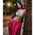 Arjun Kamath Instagram - “Stand a little less between me and the sun” ~ Diogenes Actress- @malavikamohanan_ Costume designed and styled by- @wardha_ahamed Make-up- @makeupartistkarishmabajaj Hair- @nishisingh_muah Public Relations- @theitembomb Accessories- @creativegemsandjewels #CapturedOnCanon with a Canon EOS 5D Mark IV @canonindia_official #portrait #actress #malavikamohanan #nature #green #pink #sunlight #photography #arjunkamathphotography #mumbai #DoGreatWithCanon #MentorsInFocus #EOSMaestro #malavikamohanan #bollywood #instagood #instagram