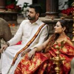 Arjun Kamath Instagram - Calm as a serenade, colourful as the heart that sings it. Peaceful and yet jovial in the purest way possible. Vibrant but also earthy, rooted in culture and the beauty it brings. Doused in the tenderness of flowers and yet strong as the mould of rocks. These pictures represent the love I witnessed between Sharayu and Sharadh in all its different, heartwarming ways. It was a beautiful day at the Tamarind Tree, Bengaluru, and the three of us were filled with a peculiar bliss that morning. Perhaps it was the magic of the lush green trees that enveloped us or just the doing of gentle sunshine that moved gracefully along. After all, we must have spent a few hours ambling these rustic corners. But time only seemed to roll ever so gently with each passing minute. Even now, as I look back at these memories, I am left enchanted by the serenity, love, and gracefulness that embalmed me through it all. #CapturedOnCanon with a @canonindia_official EOS R5 with a Canon RF 24-70mm F2.8 L Lens #photography #coloursofindia #preweddingshoot #prewedding #preweddingphoto #preweddingphotography #saree #red #flowers #heritage #culture #indian #photoshoot #coupleshoot #arjunkamathphotography #bangalore #DoGreatWithCanon #MentorsInFocus #EOSMaestro #instagood #instagram The Tamarind Tree